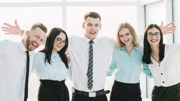 successful business team standing near the office window. the concept of successful teamwork