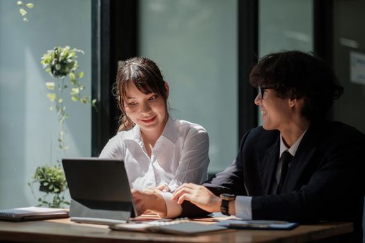 University asian students learning language using digital tablet and internet, working project together. Exam preparation. Online education concept. team of coworkers brainstorming. Meeting. Teamwork