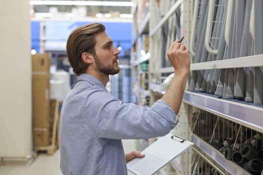 Manager use his tablet for online checking products available