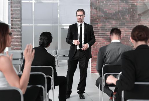 Businessman giving presentation to his Colleagues