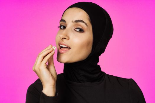 arab woman entertainment cinema popcorn fashion model ethnicity. High quality photo