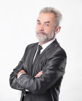 portrait of a serious businessman.isolated on grey background.