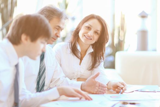 employees working with documents in office