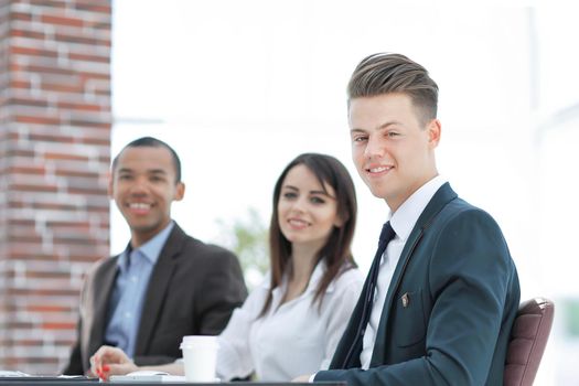 portrait of a professional business team sitting at Desk .photo with copy space