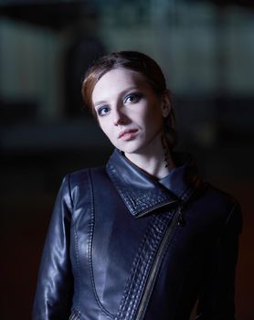 portrait of a stylish city girl with evening makeup . city life