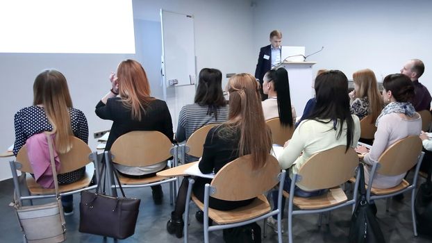 Manager holds a meeting with the business team in the spacious office