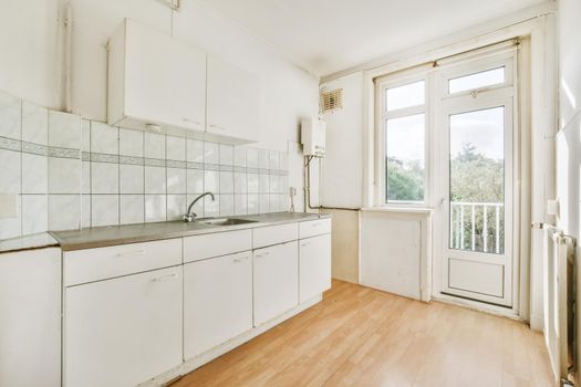 Small bright cozy kitchen in a beautiful apartment