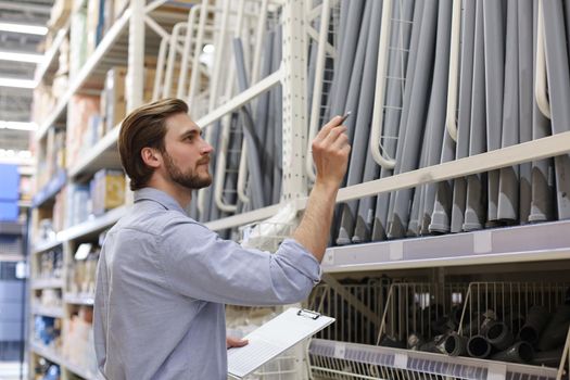 Manager use his tablet for online checking products available