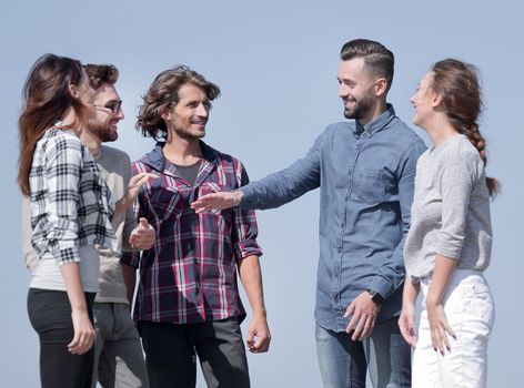 group of students discussing new ideas. outdoors.photo with copy space