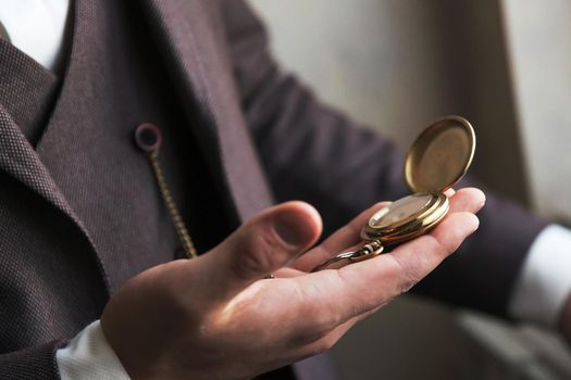 close up. business man looking at his watch. business concept