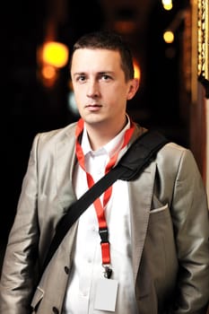 young business man portrait at night bar restaurant at conference seminar meeting