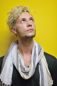 Portrait of an handsome young  man  with urban background and fashion clothes style