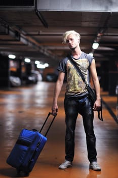 Portrait of an handsome young  man  with urban background and fashion clothes style