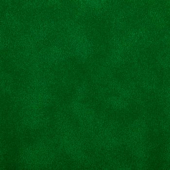 Dark green abstract uneven grunge background texture of chamois leather grain surface pattern
