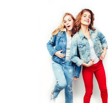 best friends teenage girls together having fun, posing emotional on white background, besties happy smiling, lifestyle people concept close up.