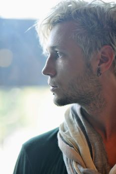 Portrait of an handsome young  man  with urban background and fashion clothes style