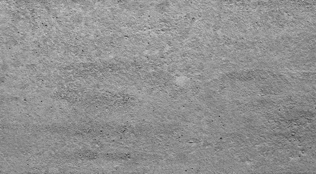 Background texture of uneven light gray concrete surface