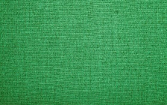 Natural green colored burlap jute sackcloth bagging canvas texture pattern background