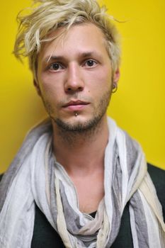 Portrait of an handsome young  man  with urban background and fashion clothes style