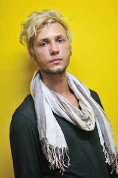 Portrait of an handsome young  man  with urban background and fashion clothes style