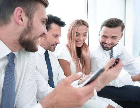 close up.business team using their smartphones.people and technology