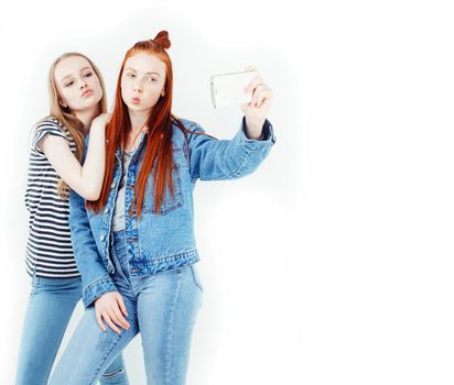 best friends teenage girls together having fun, posing emotional on white background, besties happy smiling, lifestyle people concept close up.