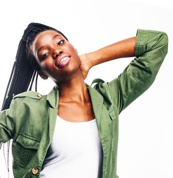 young pretty african-american girl posing cheerful emotional on white background isolated, lifestyle people concept close up