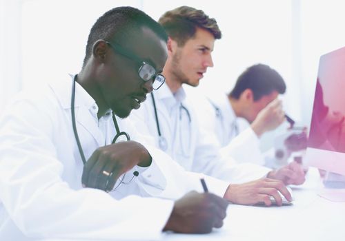 group of doctors sitting in the laboratory.people and medicine