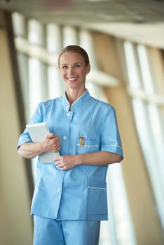 portrait of female doctor with  tablet computer at hospital