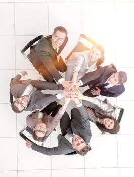 top view.a group of business people sitting in a circle.the concept of teamwork