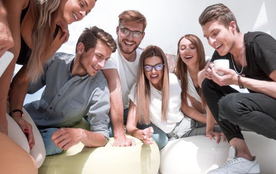 Group of casually dressed businesspeople discussing ideas in the office.concept of a startup