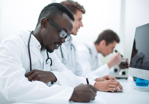 group of doctors sitting in the laboratory.people and medicine