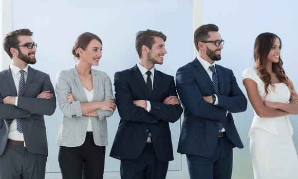 business colleagues standing in a row in the office.photo with copy space