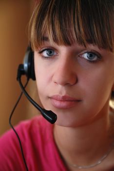 Smart young woman using head-set