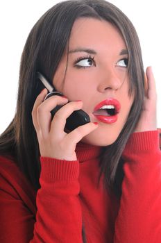 young business woman in red isolated on white talking on cell phone