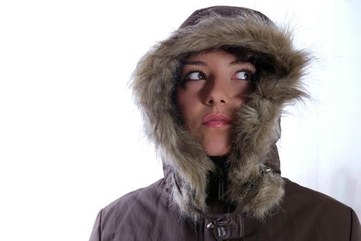 Cute young woman smiling in winter jacket