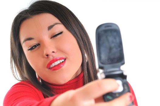 young business woman in red isolated on white talking on cell phone