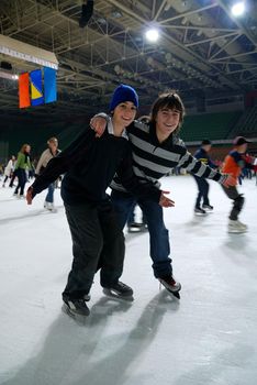 Friends enjoying ice skating