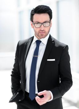 beautiful businessman in the office background.business people