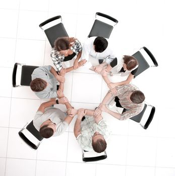 top view.creative business group folded out of the hands of the circle.the concept of teamwork