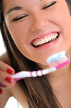 dental care concept with beautiful smilling young  woman and tooth brush