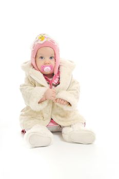 cute happy little baby with winter hat and coat isolated on white