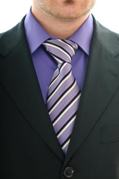 one young business man in suit with tie isolated on white