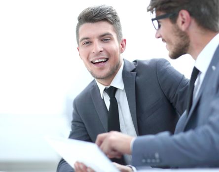 Image of two successful business partners working at meeting in office.concept of developed business