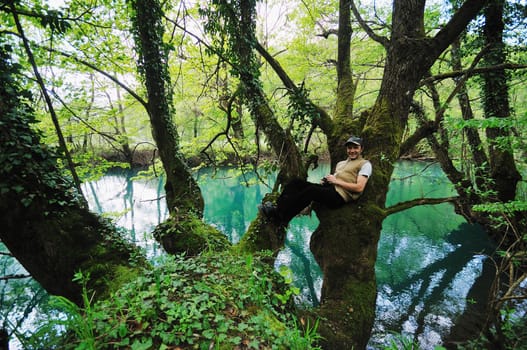 man outdoor in nature relaxing 