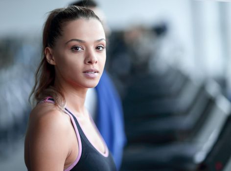 close up. attractive young woman in the gym. healthy lifestyle