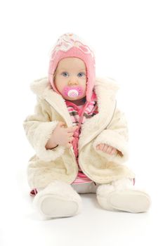 cute happy little baby with winter hat and coat isolated on white