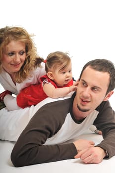 young happy family with beautiful baby isolated on white