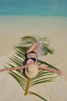 happy young woman on summer vacation on beautiful tropical beach have fun and relax