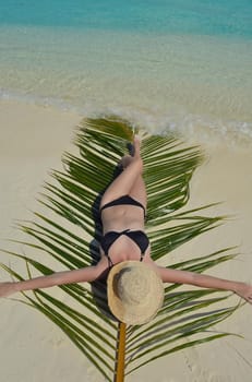 happy young woman on summer vacation on beautiful tropical beach have fun enjoy and relax